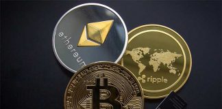 Physical cryptocurrency coins XRP Ripple, Bitcoin, Litecoin and Ethereum