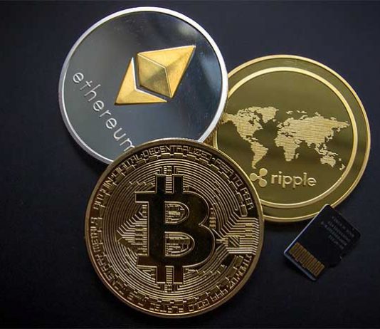 Physical cryptocurrency coins XRP Ripple, Bitcoin, Litecoin and Ethereum