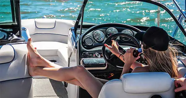 girl driving a boat what to bring