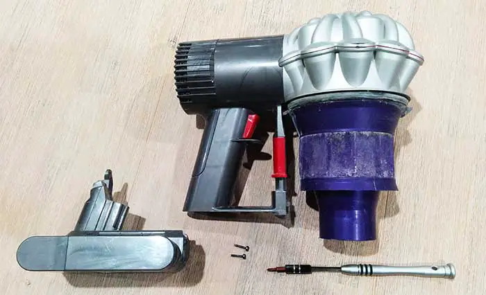 dyson v6 extended battery how to remove