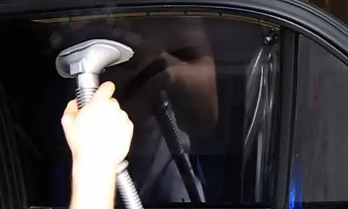 Use steamer to remove old window tint