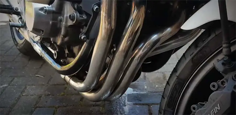 Cleaning motorcycle exhaust with harpic