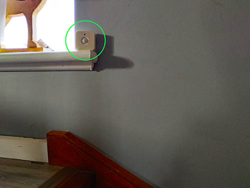 Philips hue motion sensor mounted on our staris top